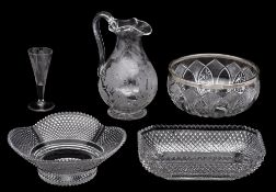 A mixed group of glass comprising a bellied ewer with pinched spout and strap handle engraved with