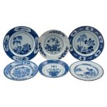 A group of six Chinese blue and white plates variously painted with a jardiniere of flowers, willow,