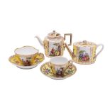 A small group of Dresden porcelain, comprising two small tea pots,