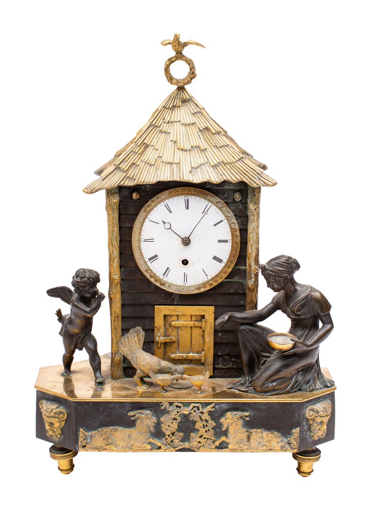 An English bronze and ormolu Georgian mantle clock in the form of a chicken coop having an