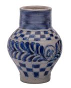 A German Westerwald blue and grey stoneware 'GR' jug with ribbed neck,