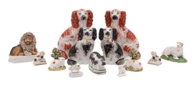 A mixed group of pottery and porcelain animals,