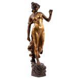 A large Art Nouveau Goldschieder bronzed and gilded terracotta figure of a maiden with flowers in