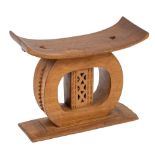 An Ashanti carved and stained hardwood stool, West Africa,