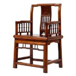 A Chinese stained hardwood elbow chair, early 20th century,