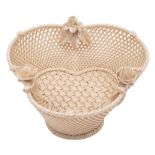 A small Belleek trefoil basket with three-strand basket work, the rim applied with flower sprays,
