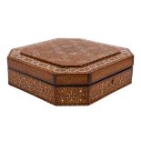 A Syrian parquetry octagonal hinged casket inlaid overall with complex geometric mosaic designs,