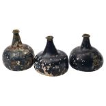 Three onion/mallet wine bottles,