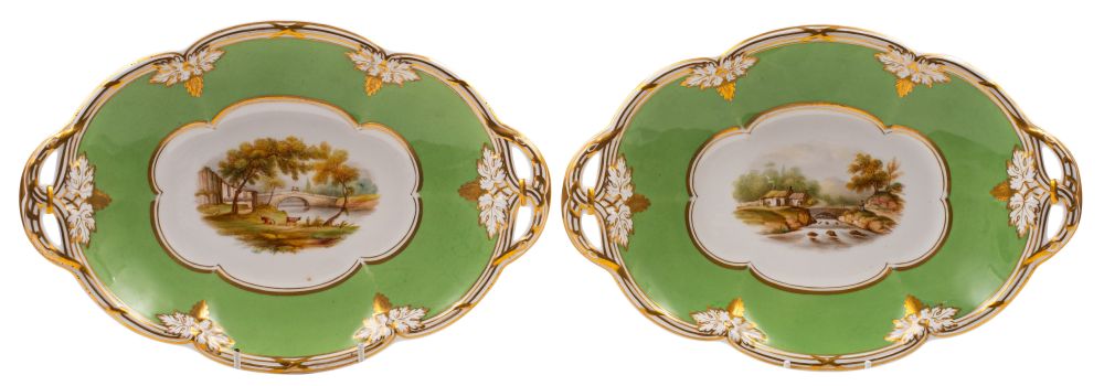 A pair of Davenport porcelain two-handled oval dessert dishes painted with river landscapes within