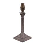 A plated Corinthian column candlestick [as a table lamp] on a stepped square base, 26cm.