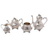 A Victorian silver plated four-piece tea and coffee service of squat circular form with engraved
