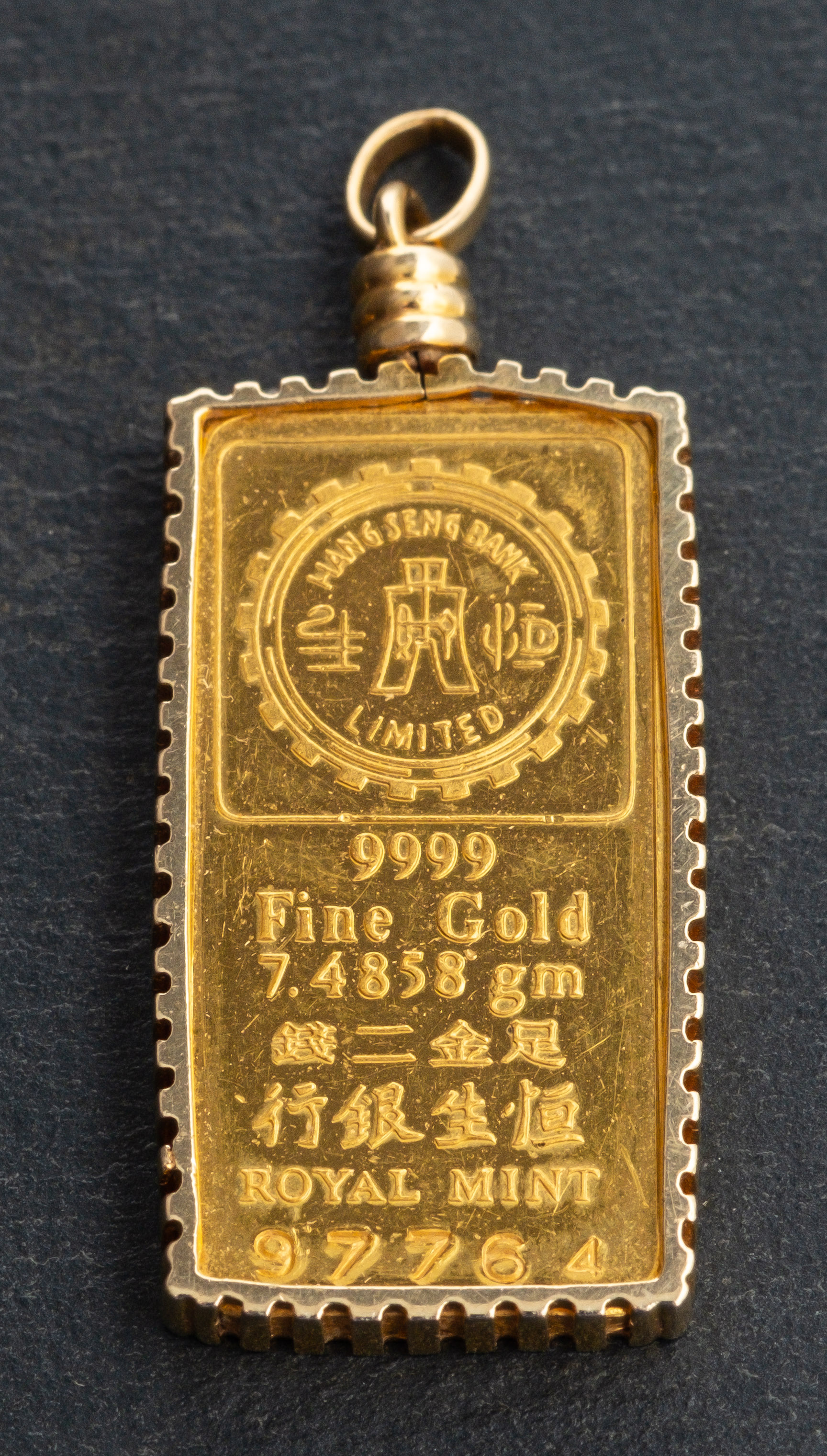 A 24ct gold ingot, marked 7. - Image 2 of 2