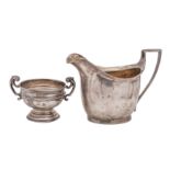 A George III silver milk jug, maker William Bennett, London 1801 of barge shape, gilt lining,