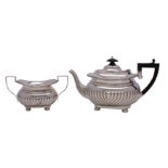 An Edward VII silver teapot and matching sugar basin, maker William M.