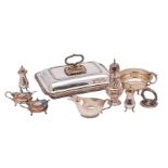 An assortment of silver plated items, comprising: a four-piece cruet set,