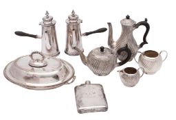 A collection of plated items comprising: an electroplated four-piece tea and coffee service with