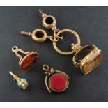 A collection of four seals, including a carnelian and bloodstone swivel fob,