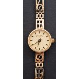 Rotary, a ladies 9ct gold wristwatch the round dial with raised baton numerals and baton hands,