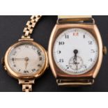 A gold wristwatch the dial with black Roman numerals, subsidiary seconds dial and moon hands,