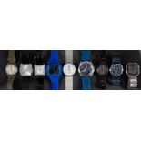 A group of nine fashion brand and other watches including Next, Hugo Boss, Braun, Nixon, Lorus,