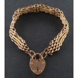 A gate-link bracelet with heart-shaped clasp, stamped '9CT', total length ca. 18cm, total weight ca.