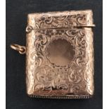 An Edwardian, 9ct gold vesta case, with floral and foliate engraving and hallmarks for Birmingham,