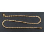 A three-row, Boston-link, bi-colour twist necklace, with Italian control marks for 18ct gold,
