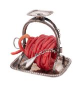 An early 19th Century old Sheffield Plate wax jack, the chamberstick with coiled wax,