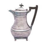 An Elizabeth II silver hot water jug, makers Mappin and Webb,