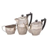 A George V three- piece silver tea service, maker Joseph Gloster Ltd,