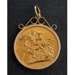 An Elizabeth II Sovereign coin, dated 1974, in a 9ct gold pendant setting,
