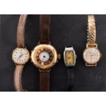 A collection of four wristwatches to include an Edwardian 18ct gold half-hunter the dial with black