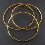 Three bangles, inner diameter ca. 6.3cm, total weight ca. 35gms.