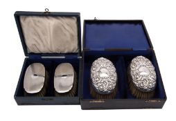 A pair of Edwardian silver backed brushes, maker William Aitken,