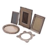 A silver oval photograph frame, another rectangular, both Birmingham 1918,