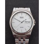 Seiko SQ100 a stainless steel gentleman's wristwatch the dial with raised baton numerals,