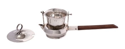 An Edward VII silver tea strainer, makers Asprey & Co.