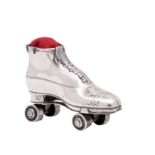 A rare Edward VII silver novelty pin cushion in the shape of a miniature roller skate,