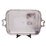 An Edward VII plated twin-handled tea tray, rectangular with engraved foliate scroll band,