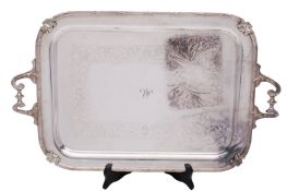 An Edward VII plated twin-handled tea tray, rectangular with engraved foliate scroll band,