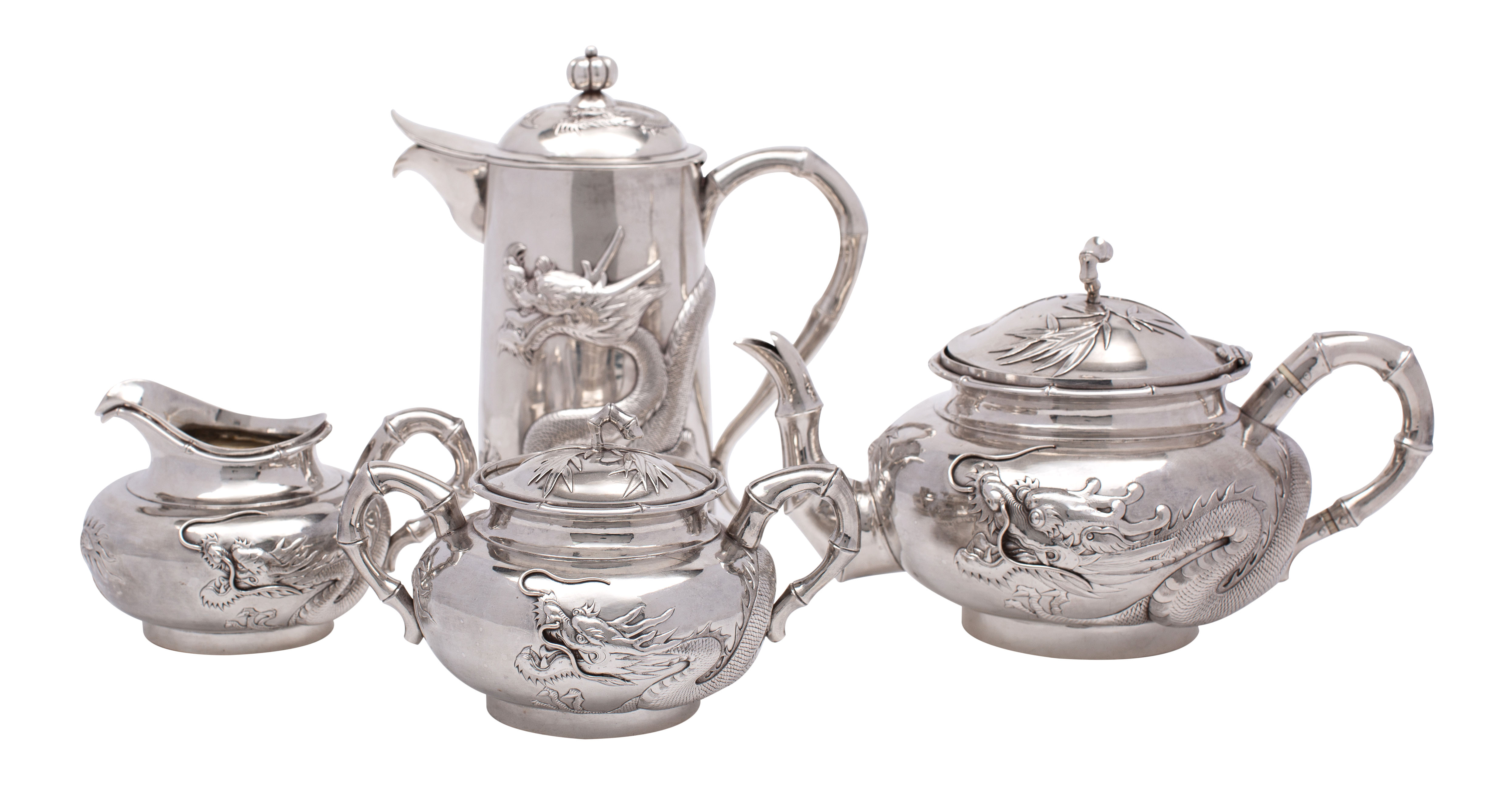 A Chinese silver matched four-piece tea service, three items by Wang Hing & Co, Hong Kong,