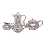 A Chinese silver matched four-piece tea service, three items by Wang Hing & Co, Hong Kong,