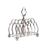 A Victorian silver seven bar toast rack, maker Charles Horner,