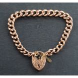 A curb-link bracelet with heart-shaped clasp, the clasp stamped '9C', each link stamped '375',