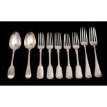 Two George III silver Old English pattern table forks, London 1799 together with a dessert spoon,