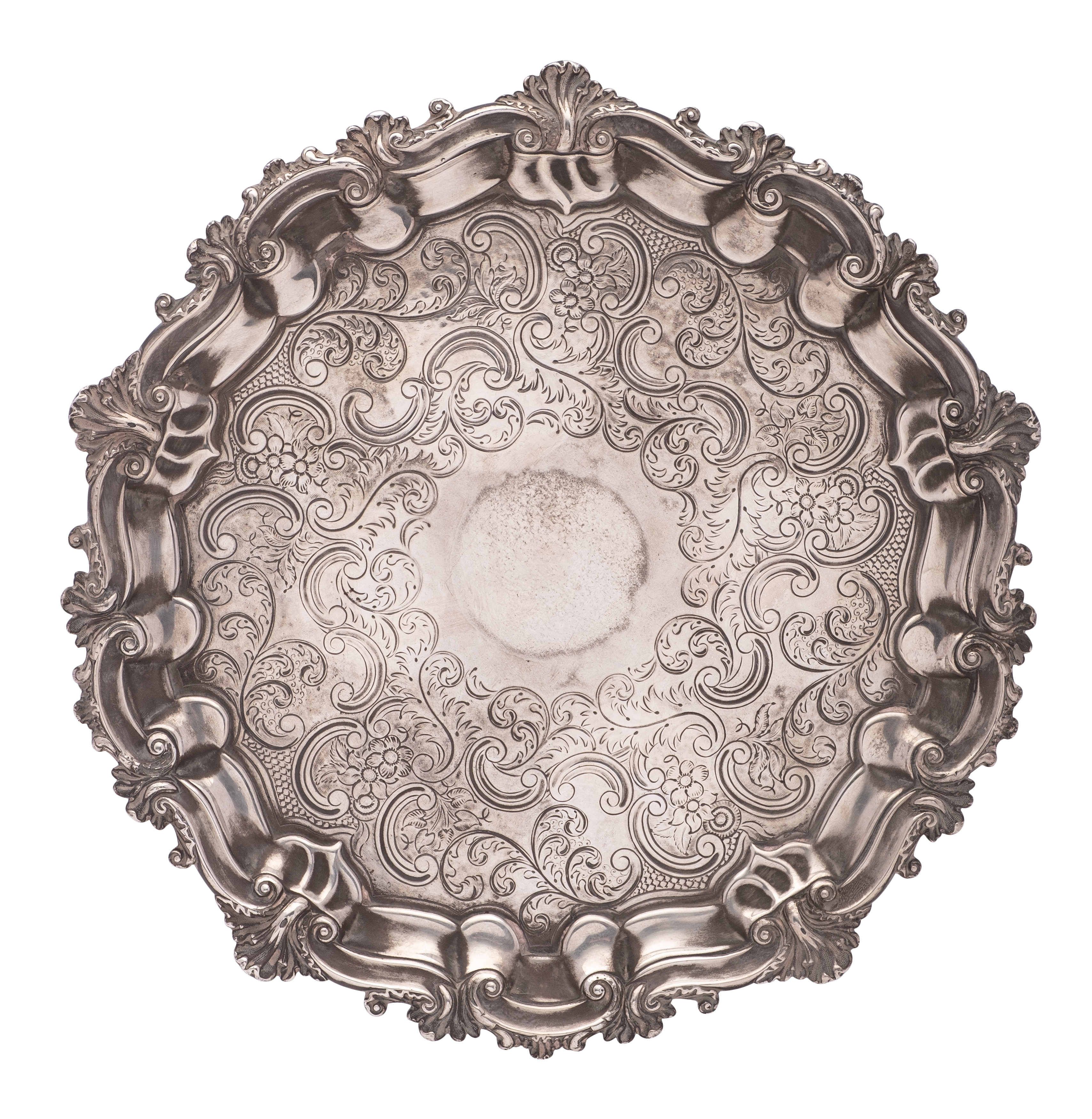 A Sheffield Plate salver, with engraved foliate and scroll decoration, raised on three swept feet,