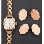 A Roamer 9ct gold ladies wristwatch, the dial with raised baton numerals and baton hands,