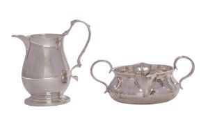 A George V silver sparrow beak cream jug, maker Adolph Barsach Davis,