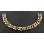 A curb-link bracelet, stamped '585', total length ca. 21.5cm, total weight ca. 42.9gms.