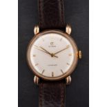 Cyma, Cymaflex, a gentleman's 9ct gold wristwatch the round cream dial with raised baton numerals,